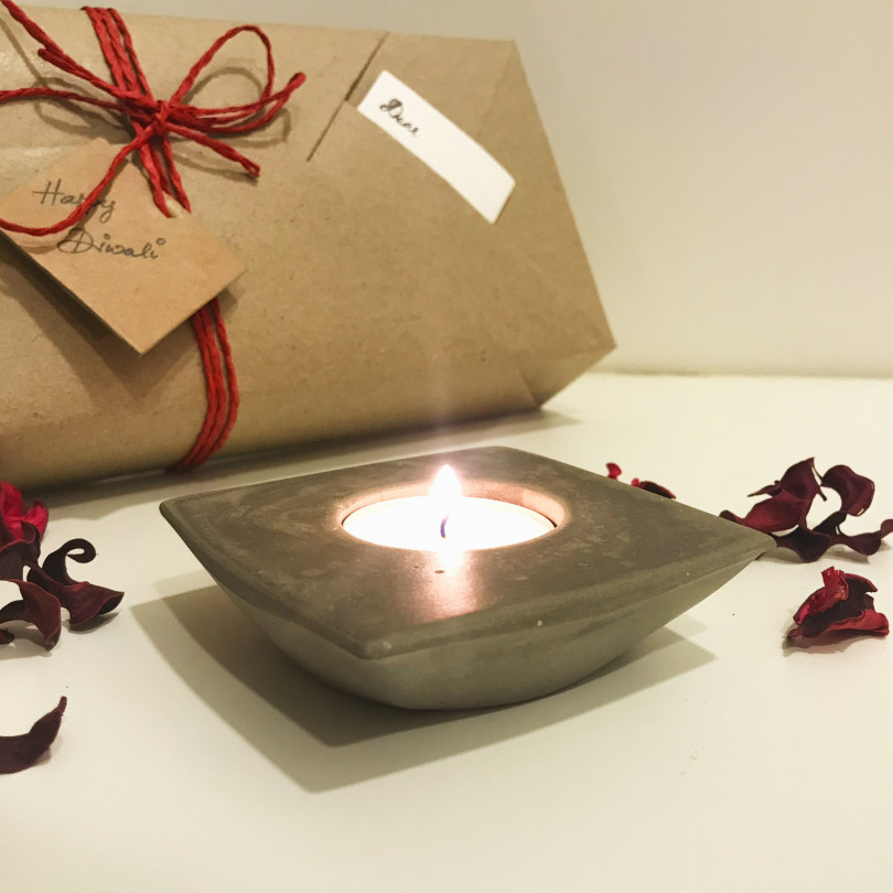 Concrete candle holder with scented candles