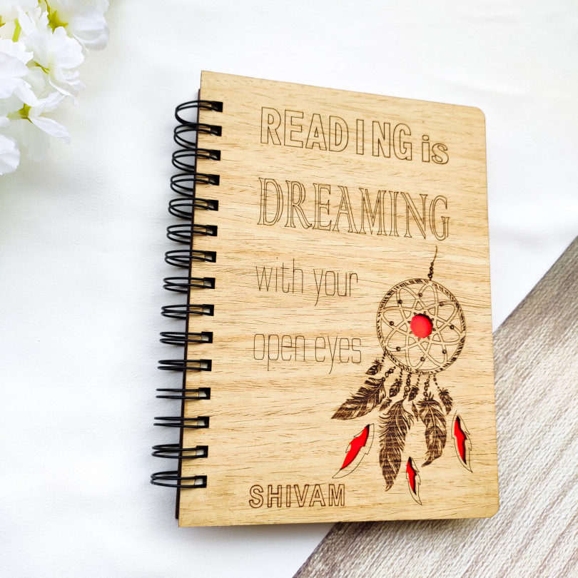 Laser cut and engraved wooden diary with dreamcatcher design and quote