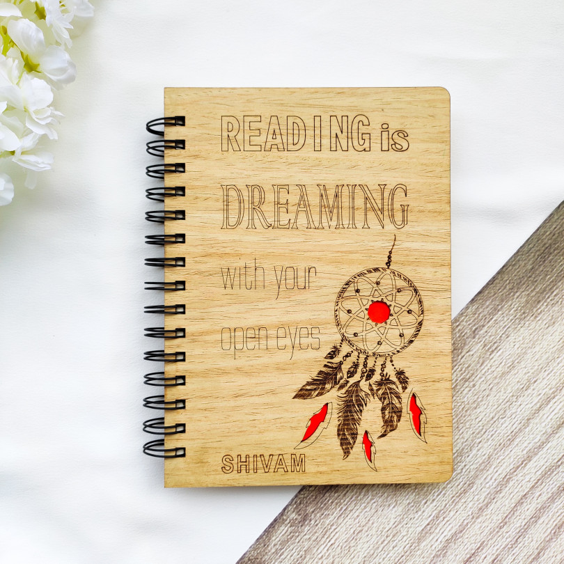 Laser cut and engraved wooden diary with dreamcatcher design and quote