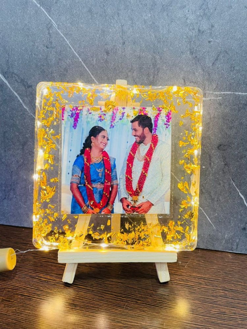 Photo frame with light and stand