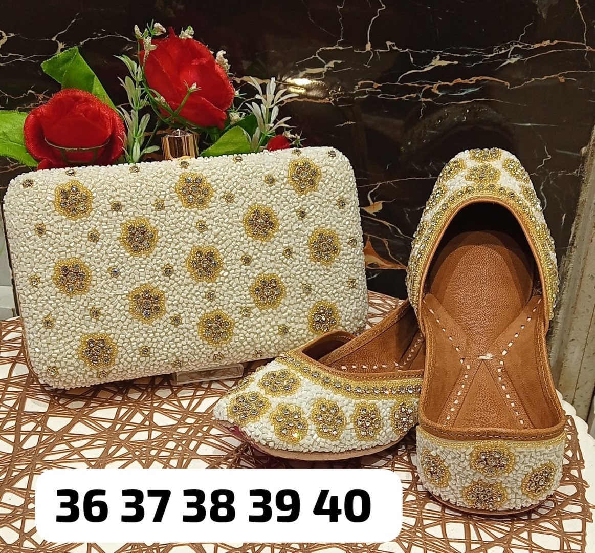 clutch handbag and jutti sandals for women
