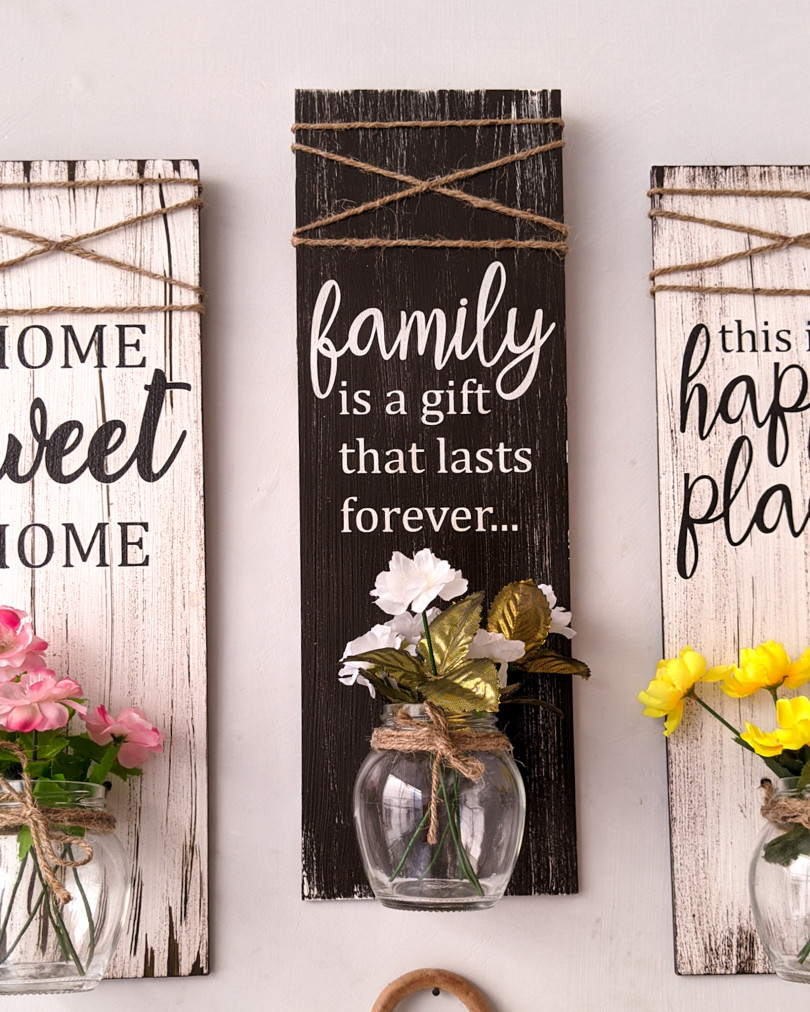 'Family is a gift' wooden wall décor with mason jar